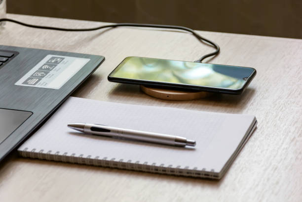 istock The charger is connected to the phone 1265208632