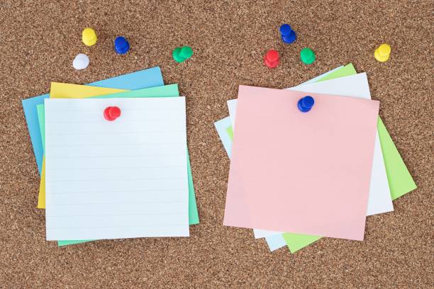 istock Collection of different colored sheets of note papers with curled corner 1265211140