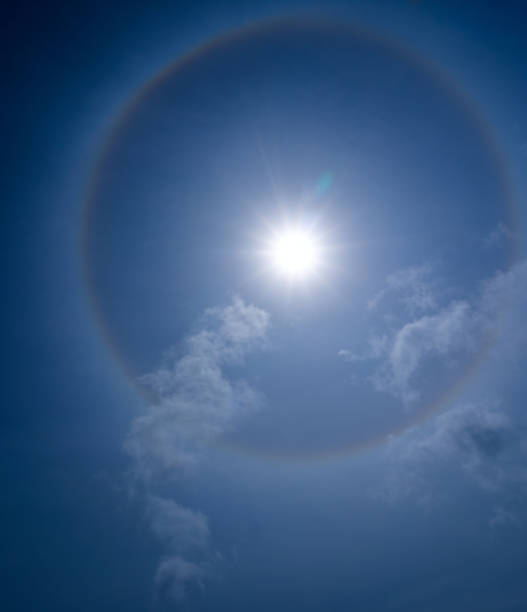 istock Sun halo in the blue sky. 1265211360