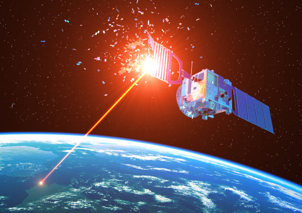 istock Laser Weapon From Earth Destroys Satellite In Space 1265211437