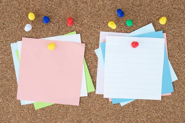 istock Collection of different colored sheets of note papers with curled corner 1265211459