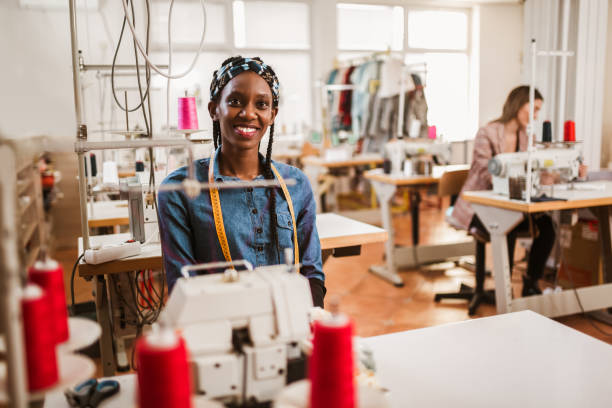 istock Dressmaker woman working with sewing machine 1265212774