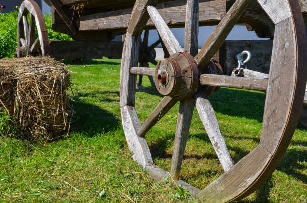 istock a wooden cart and hay 1265212990