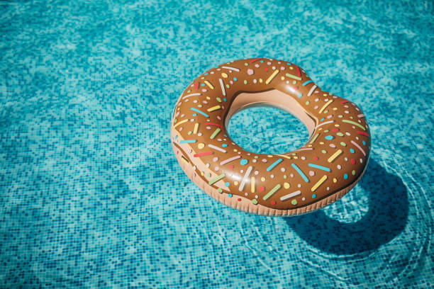 istock Rubber ring as a donut floating in the swimming pool 1265214382