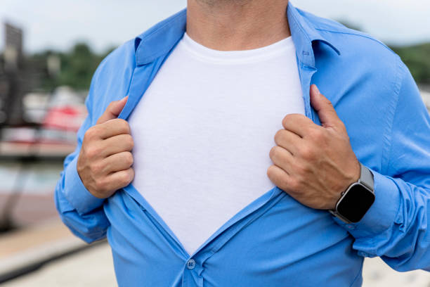 Man opening his shirt. Copy space, add text or logo