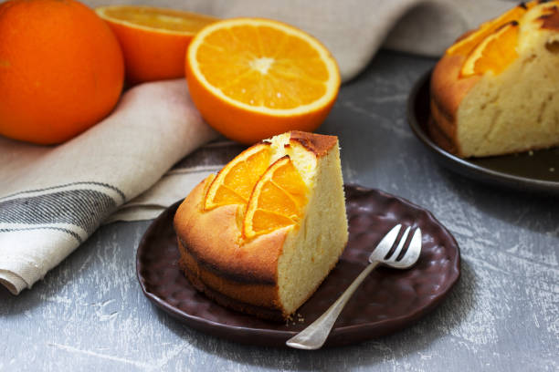 istock Orange cake with slices of orange on a concrete background. 1265215191