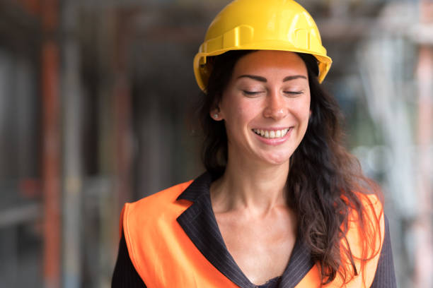 istock Cheerful woman engineer, close up 1265217015