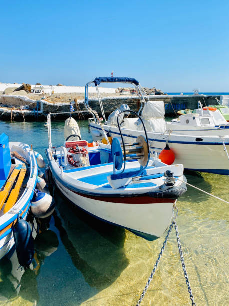 istock Fishing boat lying on anker in Ikaria, Greece 1265219057