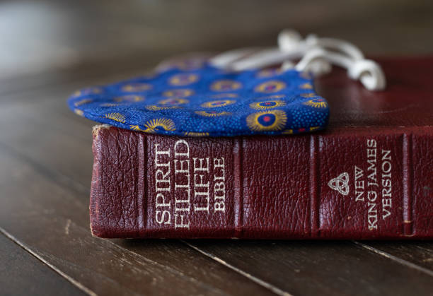 istock A mask on a closed Bible 1265225727