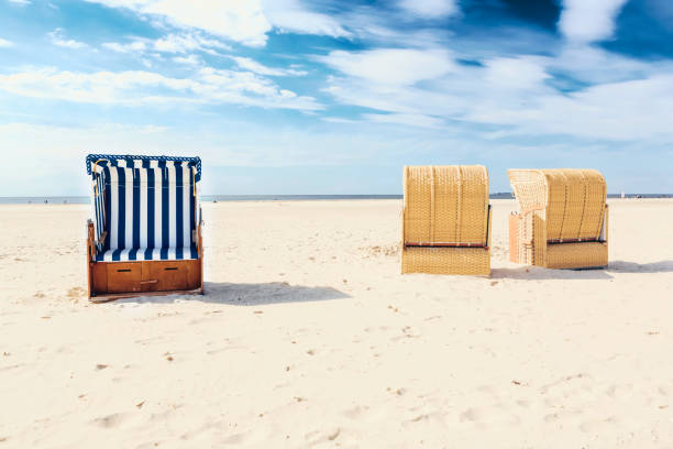istock Blue and white striped beach chair or bench 1265228081