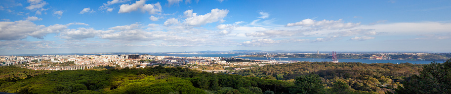 Lisbon panoramic view from Monsanto forest with airplane going to the airport