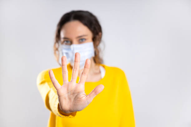 istock Young woman with protection mask 1265229937