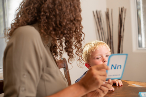 A child being tutored at home.