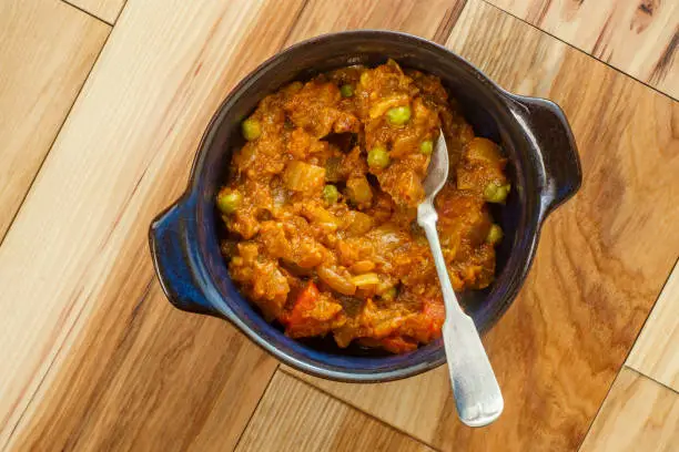Indian food vegetarian thali including baingan bharta minced eggplant curry with vegetables