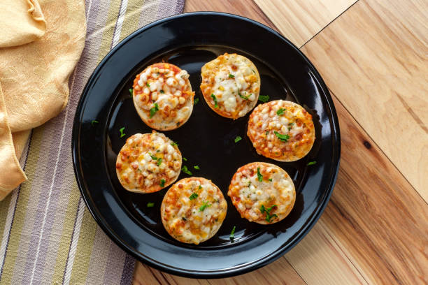 American finger food Hors d'oeuvre mini three-cheese pizza bagels