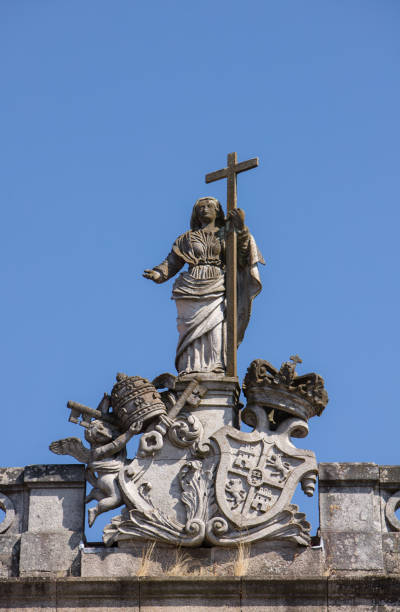 istock Religious stone statue on top of one building 1265236651