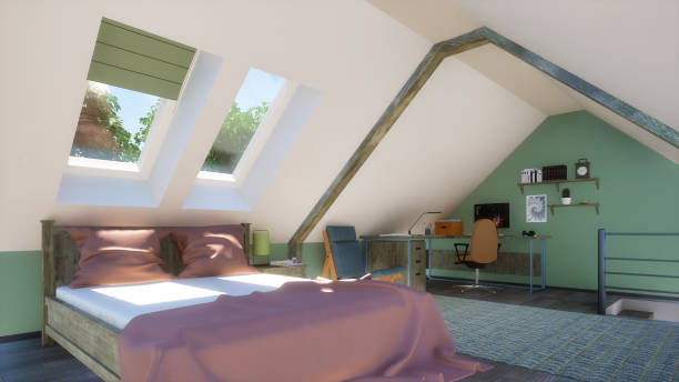 istock Bedroom in attic with double bed and home office 1265239343