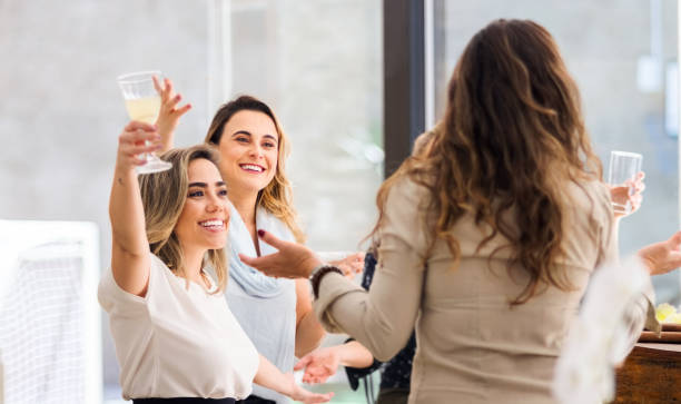istock Welcoming a friend at party 1265241507