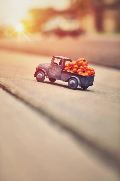 istock Miniature truck loaded with pumpkins for Fall 1265242964