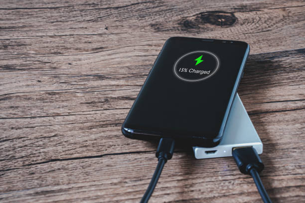 istock Phone connect to power bank on top view 1265248948