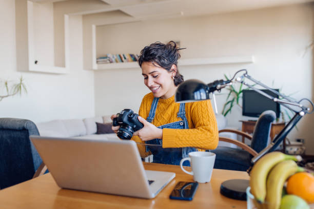 istock Young photographer working from home as a freelancer 1265249326