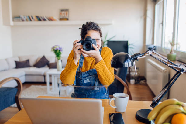 istock Girl making photos at home 1265249333