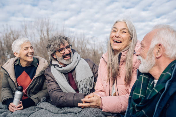 istock Happy seniors enjoying their weekend adventure in the nature 1265253233
