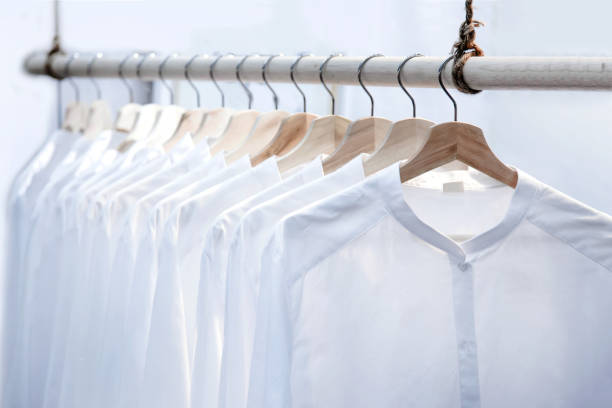 istock classic men white shirt on shelf 1265257140