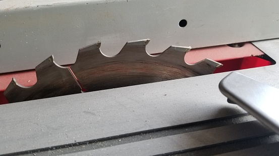 Closeup of sharp metal table saw bladd