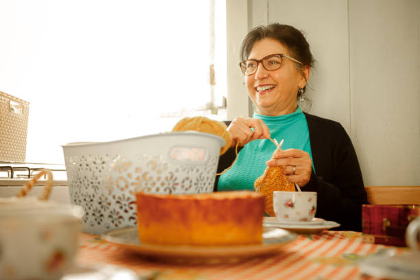 istock young grandmother knitting at home 1265264728