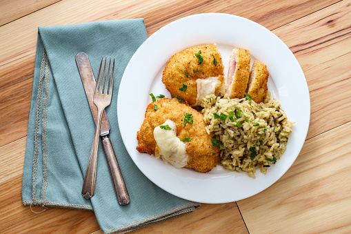 Chicken cordon bleu served with herbed long grain wild rice mix