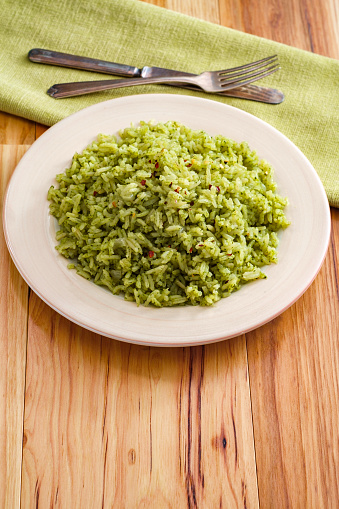 Simple yet flavorful Mexican green rice made with onions cilantro and spinach