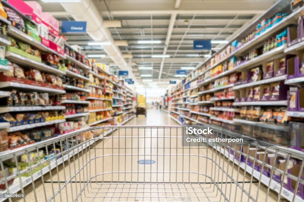 Unrecognizable supermarket aisle as background Supermarket Stock Photo