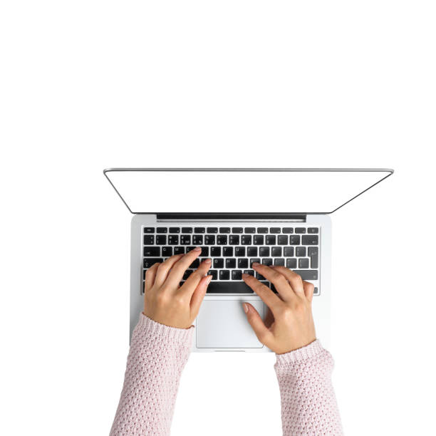istock Female hands on a laptop with top view and white background. Isolated. Isolated. 1265276536