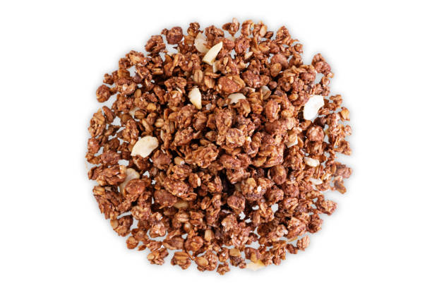 istock Chocolate nuts oatmeal granola on a white isolated background 1265276692
