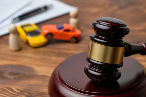 istock Traffic violation concept by car next to judge hammer 1265276784