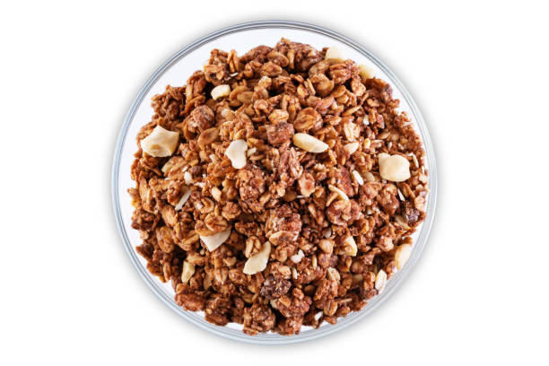 istock Chocolate nuts oatmeal granola on a white isolated background 1265276838