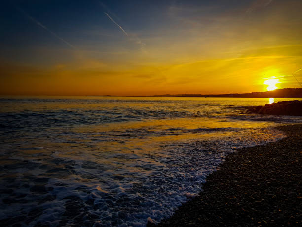 istock Sunset over the beautiful shore of nice 1265284466