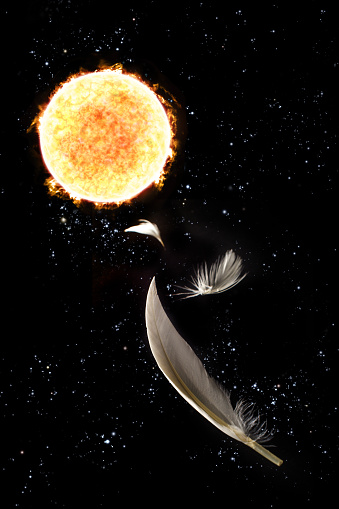 Greek myth of Icarus who flew too close to the sun with feathers falling from sky