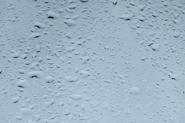 istock texture of bokeh drops on glass in front of sky 1265288018
