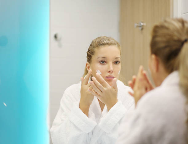 istock Magic anti-aging cream.Applying the cream 1265288782