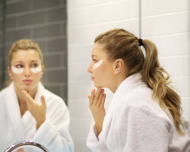 istock Magic anti-aging cream.Applying the cream 1265288845