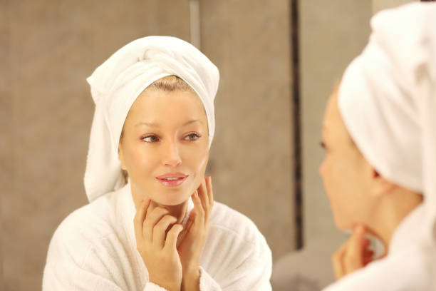 istock Magic anti-aging cream.Applying the cream 1265288865