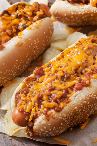 istock Chili and Cheese Hotdog with Potato Chips 1265293346