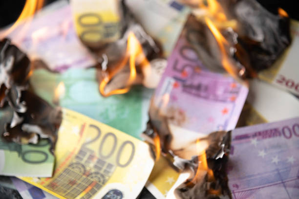 istock burning euro bills for financial crisis background 1265301744