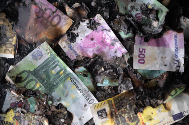 istock burning euro bills for financial crisis background 1265301749