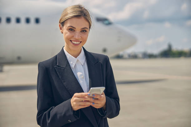 istock Merry airport employee posing for the camera 1265304551
