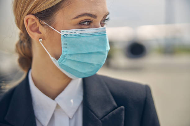 istock Young blonde female employee is looking aside 1265304566