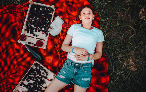 istock The girl enjoys nature 1265309143