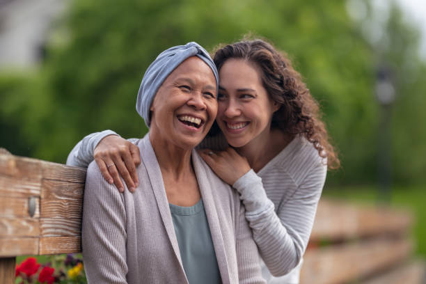 istock Woman embracing her mother 1265315817